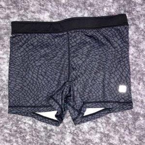 Hind spandex, color gray and black, woman’s size medium